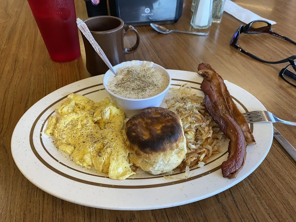 Two Scrambled Bacon Crispy Hash Browns and Homemade Biskit with Gravy